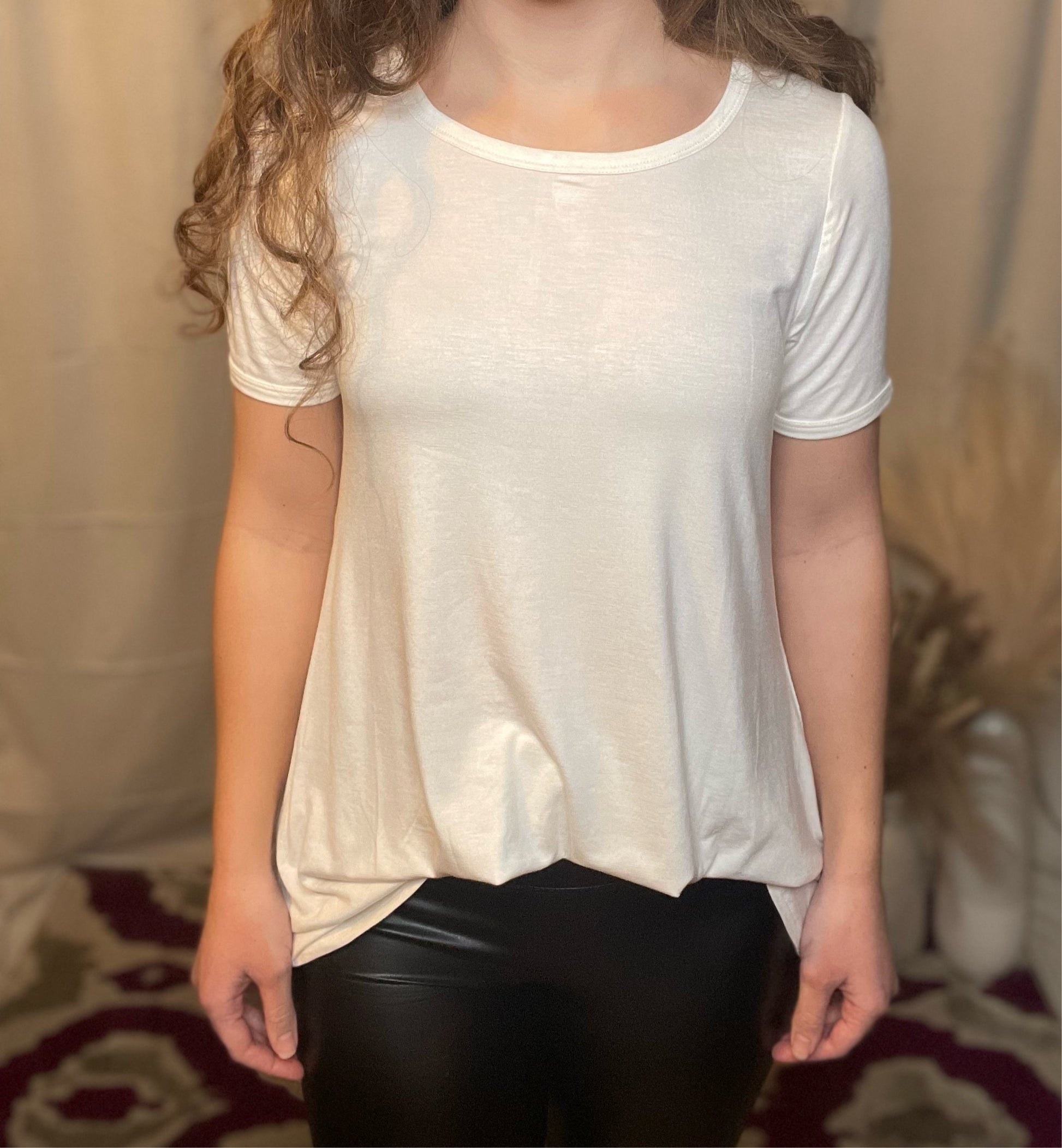 Basic off white tunic tee with short sleeves and round neckline